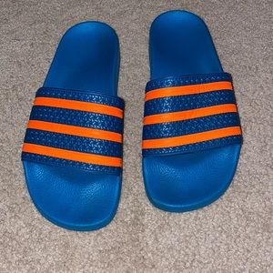 Adidas blue and orange slides